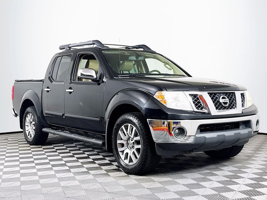 2012 Nissan Frontier 4.0 SL Crew Cab 4X4 AT SWB's photo
